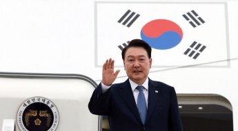 G20 행사장서 尹 수행원 몸싸움…용산 "브라질측 착오, 사과 받았다"