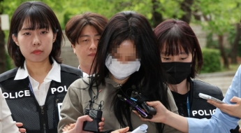 손흥민에 '임신 협박' 일당 영장심사 출석…질문엔 '묵묵부답'