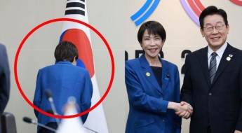 "한국 기어오른다"던 다카이치, '태극기'에 보인 이례적 행동