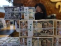 다카이치 엔저 낙관론에도 日금융 