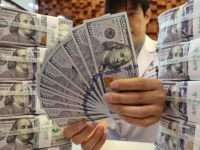 달러, 10년 만에 최대 폭 하락…내년에도 약세 전망