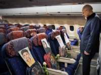 "168명과 함께 왔다" 이란 대표단, 희생된 아이들 영정사진 싣고 비행