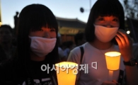 [포토] 환하게 불밝힌 촛불!