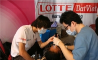 롯데홈, 베트남 진출 기념 호치민서 대규모 의료봉사 실시