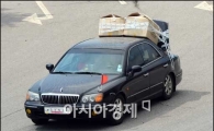 [포토]짐 잔뜩 실은 입경차량