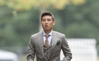[포토] 구자철 '우산으로 가리기 아까운 패션'