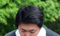 [포토]세월호 희생자 위해 고개 숙여 인사하는 금수원 관계자