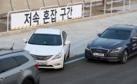 ‘두 손 두 발’ 다 든 운전자… 무인차 시대가 왔다
