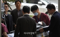 [포토]응급차 타고 법원 출두한 이재현 CJ회장