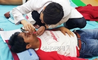 동신대 광주한방병원,외국인근로자 한방 의료봉사 실시