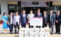 “이웃사랑 담은 장흥 우렁이 총각쌀 한되요”
