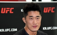 '스턴건' 김동현, 아시아 UFC 최다승 실패…코빙턴에 판정패