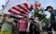 [포토]태극기와 성조기 휘날리며