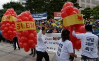 [포토]한국자유총연맹, 북한 6차 핵실험 규탄 퍼포먼스