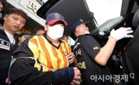 [포토]얼굴 가리고 현장 벗어나는 '어금니 아빠'