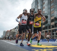 "People Came Before Personal Records": Three Runners Finish Together at the Boston Marathon Finish Line