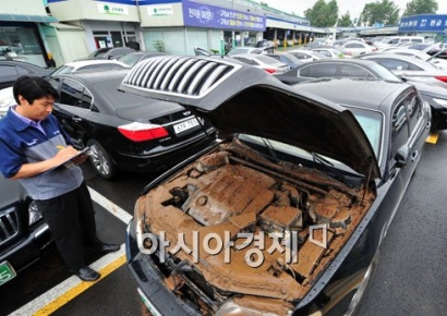 손익분기점 육박한 차보험 손해율…손보사들 장마 대응 모드