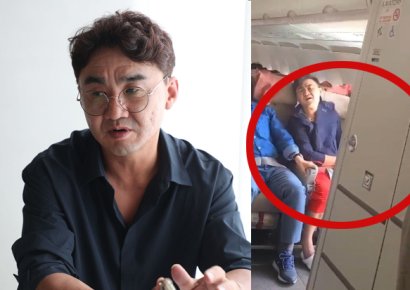 '요놈 잡았다'…항공기 문 연 범인 제압한 빨간바지 승객