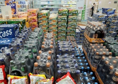 하이볼에 밀린 쏘맥…하이트진로, 맥주 성수기 '쓴맛'