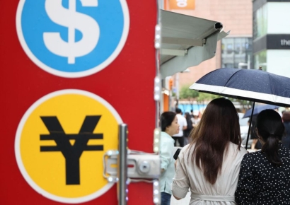 '엔저 직격' 허리띠 졸라맨 일본인 유학생…日취업 한국인은 "환전 안해"
