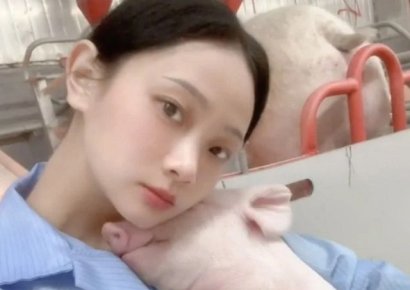 "돼지 키우며 한달 114만원 벌지만 행복해요"…중국 26살 대졸여성 화제