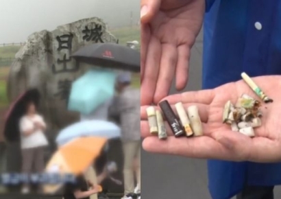 중국말로 안내방송해도…성산일출봉서 담배꽁초 버리는 관광객들