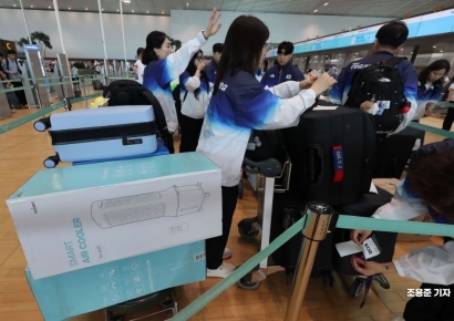 [포토] 냉방기 가지고 출국하는 올림픽 대표단