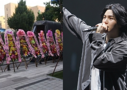 "슈가, 포토라인 서기 전 탈퇴해"…하이브 사옥 화환 시위