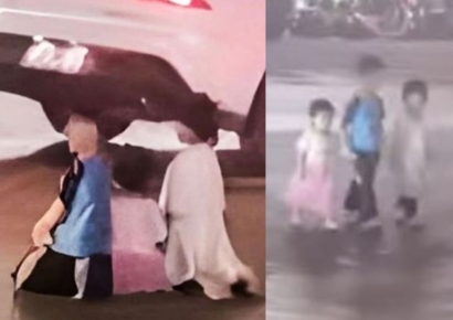 도로에 2살배기 딸 무릎 꿇린 아빠…"집 나간 아내 돌아오라고"(영상)