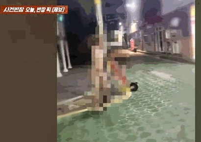 알몸으로 거리 배회한 남성…"입엔 흰 거품, 문신·흉터 가득"