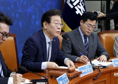 [포토] 이재명 "1500만 투자자 고려해 금투세 폐지 동의키로"