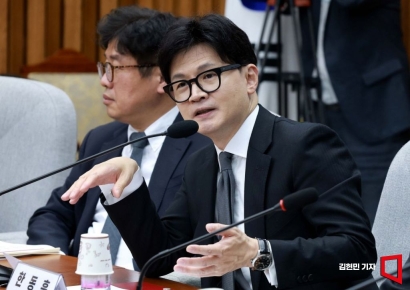 野, 가상자산 공제 5000만원 상향 결정…한동훈 "2년 유예해야"