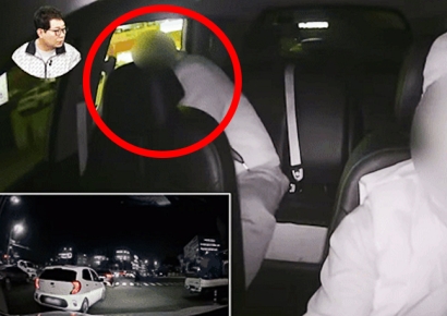 택시 창밖으로 목 내민 승객, 급정거에 다쳤는데 누구 잘못?