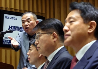 [2025국감]수차례 언성 높인 명태균 "교도소에 있는데 오 시장이 고발"
