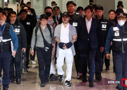 [포토] 삼엄한 경계 속 송환된 '마약왕'