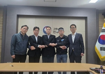 화물연대-BGF 조인식, 하루 넘기나 … 잠정 연기 후 조율 중