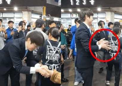 하정우, 시장서 '악수 후 손털기' 논란…국힘 "유권자가 벌레냐"