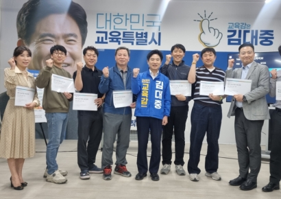 [6·3선거]김대중, 502억 '민주전당'·1.4만 세대 '통학버스' 약속